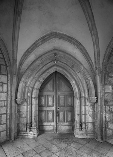 Portail d'entrée de la nef sous le porche. © Région Bourgogne-Franche-Comté, Inventaire du patrimoine