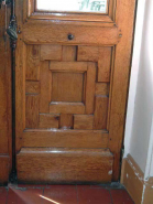 Vue de détail d'un panneau bois d'une porte d'entrée, assemblage vu de l'intérieur du bâtiment. © Région Bourgogne-Franche-Comté, Inventaire du patrimoine