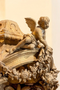 Détail : putti vu de trois-quarts. © Région Bourgogne-Franche-Comté, Inventaire du patrimoine