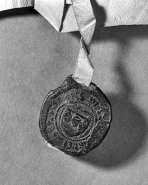 Sceau de l'infirmier Pierre Morel pendu à une charte de 1424. © Région Bourgogne-Franche-Comté, Inventaire du patrimoine