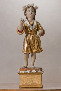 Face avec couronne et médaille. © Région Bourgogne-Franche-Comté, Inventaire du patrimoine