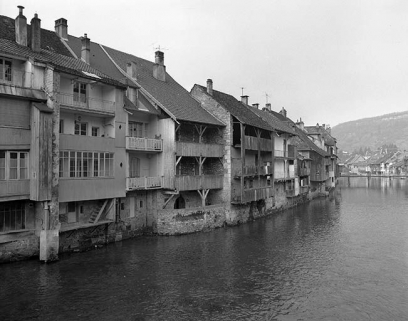 Façades postérieures des maisons de la rue Saint-Laurent depuis le grand pont, vue générale rapprochée. © Région Bourgogne-Franche-Comté, Inventaire du patrimoine