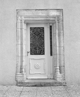 Porte d'entrée du logis. © Région Bourgogne-Franche-Comté, Inventaire du patrimoine Porte d'entrée du logis. © Région Bourgogne-Franche-Comté, Inventaire du patrimoine