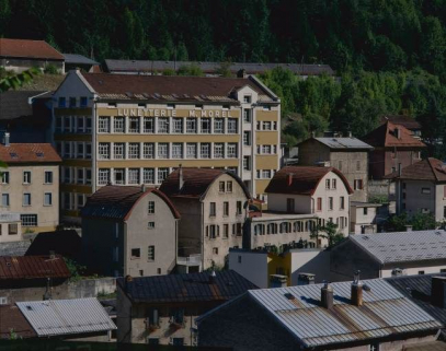 Façade postérieure du bâtiment de 1936, de trois quarts gauche. © Région Bourgogne-Franche-Comté, Inventaire du patrimoine Façade postérieure du bâtiment de 1936, de trois quarts gauche. © Région Bourgogne-Franche-Comté, Inventaire du patrimoine