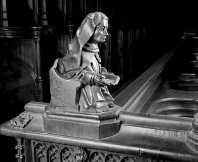 Statuette de la quatrième jouée basse : moine lisant. © Région Bourgogne-Franche-Comté, Inventaire du patrimoine