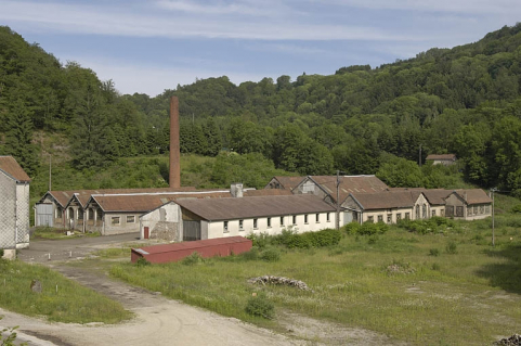 Les bâtiments de production vus depuis l'ouest. © Région Bourgogne-Franche-Comté, Inventaire du patrimoine Les bâtiments de production vus depuis l'ouest. © Région Bourgogne-Franche-Comté, Inventaire du patrimoine