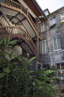 Vue de l'escalier à cage ouverte, de trois quart gauche. © Région Bourgogne-Franche-Comté, Inventaire du Patrimoine