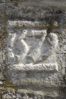 Détail d'un réemploi, portant la date 1579, au niveau de la maison Billet. © Région Bourgogne-Franche-Comté, Inventaire du patrimoine