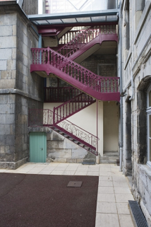 Vue d'ensemble de l'escalier à cage ouverte en dessous de la verrière. © Région Bourgogne-Franche-Comté, Inventaire du Patrimoine