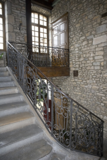 Intérieur : détail de la rampe en fer forgé de l'escalier d'honneur. © Région Bourgogne-Franche-Comté, Inventaire du Patrimoine