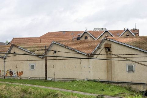 Façades sud des ateliers de fabrication. © Région Bourgogne-Franche-Comté, Inventaire du patrimoine Façades sud des ateliers de fabrication. © Région Bourgogne-Franche-Comté, Inventaire du patrimoine