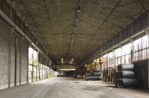 Vue intérieure d'un entrepôt industriel. © Région Bourgogne-Franche-Comté, Inventaire du patrimoine Vue intérieure d'un entrepôt industriel. © Région Bourgogne-Franche-Comté, Inventaire du patrimoine