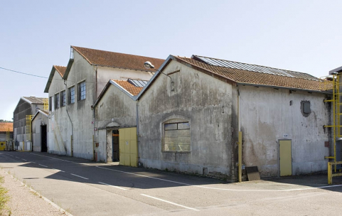 Pignons ouest de magasins industriels et de la fonderie. © Région Bourgogne-Franche-Comté, Inventaire du patrimoine Pignons ouest de magasins industriels et de la fonderie. © Région Bourgogne-Franche-Comté, Inventaire du patrimoine