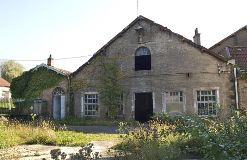 Pignon de l'atelier de réparation. © Région Bourgogne-Franche-Comté, Inventaire du patrimoine Pignon de l'atelier de réparation. © Région Bourgogne-Franche-Comté, Inventaire du patrimoine