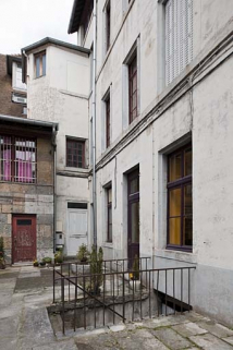 Détail de la façade postérieure de l'immeuble, partie gauche. © Région Bourgogne-Franche-Comté, Inventaire du Patrimoine