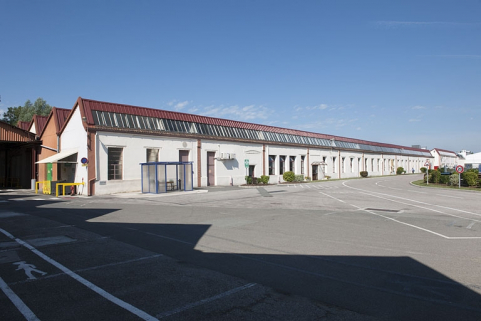 Ateliers de fabrication ouest. Vue d'ensemble depuis l'est. © Région Bourgogne-Franche-Comté, Inventaire du patrimoine Ateliers de fabrication ouest. Vue d'ensemble depuis l'est. © Région Bourgogne-Franche-Comté, Inventaire du patrimoine