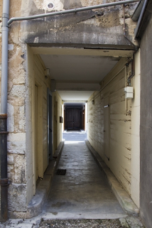 Vue des passages cochers en enfilade depuis la deuxième cour. © Région Bourgogne-Franche-Comté, Inventaire du Patrimoine