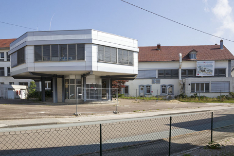Usine, 1er corps de bâtiment : façade postérieure. Au 1er plan, le corps d'entrée. © Région Bourgogne-Franche-Comté, Inventaire du patrimoine Usine, 1er corps de bâtiment : façade postérieure. Au 1er plan, le corps d'entrée. © Région Bourgogne-Franche-Comté, Inventaire du patrimoine