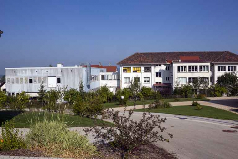 Vue d'ensemble, depuis l'est (atelier de 1952 à droite, extension de 1970-1971 à gauche). © Région Bourgogne-Franche-Comté, Inventaire du patrimoine