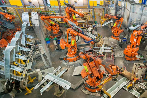 Atelier de ferrage. Soudage des pièces de la caisse en blanc dans un îlot robotisé (1). © Région Bourgogne-Franche-Comté, Inventaire du patrimoine Atelier de ferrage. Soudage des pièces de la caisse en blanc dans un îlot robotisé (1). © Région Bourgogne-Franche-Comté, Inventaire du patrimoine