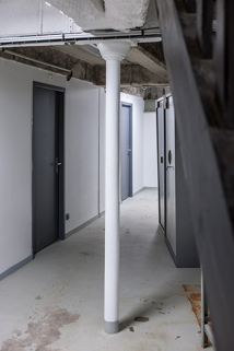 Entrepôt, soubassement : charpente en béton et poteau en fonte. © Région Bourgogne-Franche-Comté, Inventaire du patrimoine Entrepôt, soubassement : charpente en béton et poteau en fonte. © Région Bourgogne-Franche-Comté, Inventaire du patrimoine