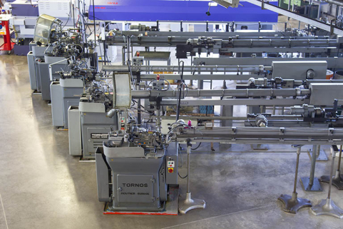 Machines à décolleter Tornos et leurs ravitailleurs (côté sud). © Région Bourgogne-Franche-Comté, Inventaire du patrimoine Machines à décolleter Tornos et leurs ravitailleurs (côté sud). © Région Bourgogne-Franche-Comté, Inventaire du patrimoine