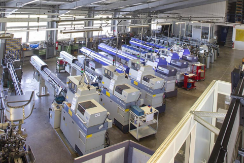 Machines à décolleter à commande numérique : usine de décolletage des Ets Perrenoud (rue Pierre Mendès-France). © Région Bourgogne-Franche-Comté, Inventaire du patrimoine Machines à décolleter à commande numérique : usine de décolletage des Ets Perrenoud (rue Pierre Mendès-France). © Région Bourgogne-Franche-Comté, Inventaire du patrimoine