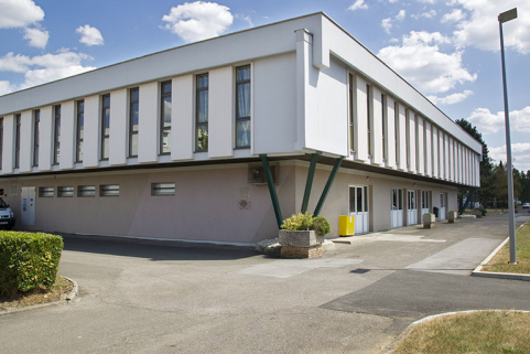 Angle nord-ouest de la cantine, les entrées et sorties sur la façade ouest. © Région Bourgogne-Franche-Comté, Inventaire du patrimoine