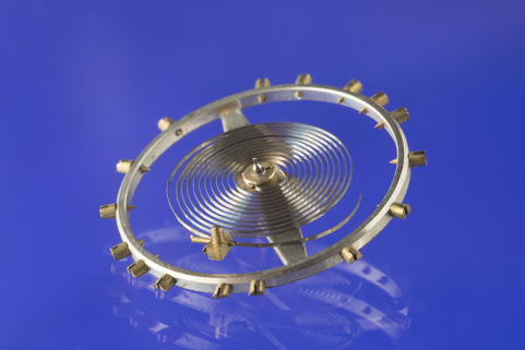 L'organe réglant de la montre : le balancier-spiral. © Région Bourgogne-Franche-Comté, Inventaire du patrimoine L'organe réglant de la montre : le balancier-spiral. © Région Bourgogne-Franche-Comté, Inventaire du patrimoine
