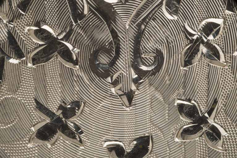 Détail de la gravure d'un fond de boîte. © Région Bourgogne-Franche-Comté, Inventaire du patrimoine