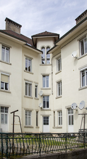 Façade postérieure : revers du pan coupé. © Région Bourgogne-Franche-Comté, Inventaire du patrimoine Façade postérieure : revers du pan coupé. © Région Bourgogne-Franche-Comté, Inventaire du patrimoine