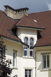Façade postérieure : niveau supérieur au revers du pan coupé. © Région Bourgogne-Franche-Comté, Inventaire du patrimoine Façade postérieure : niveau supérieur au revers du pan coupé. © Région Bourgogne-Franche-Comté, Inventaire du patrimoine