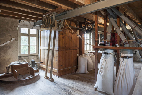 Vue d'ensemble du deuxième étage. Chambre à farine, transmission et ensachage. © Région Bourgogne-Franche-Comté, Inventaire du patrimoine