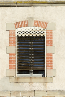 Détail d'une baie. © Région Bourgogne-Franche-Comté, Inventaire du patrimoine Détail d'une baie. © Région Bourgogne-Franche-Comté, Inventaire du patrimoine