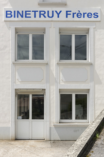 Bâtiments rue de l'Horlogerie : deux premiers niveaux de la façade latérale est. © Région Bourgogne-Franche-Comté, Inventaire du patrimoine Bâtiments rue de l'Horlogerie : deux premiers niveaux de la façade latérale est. © Région Bourgogne-Franche-Comté, Inventaire du patrimoine