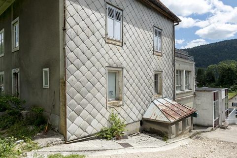 Maison et ateliers : façade antérieure, de trois quarts gauche. © Région Bourgogne-Franche-Comté, Inventaire du patrimoine Maison et ateliers : façade antérieure, de trois quarts gauche. © Région Bourgogne-Franche-Comté, Inventaire du patrimoine
