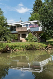 Vue de la villa Kielwasser depuis la rive du village © Région Bourgogne-Franche-Comté, Inventaire du patrimoine Vue de la villa Kielwasser depuis la rive du village © Région Bourgogne-Franche-Comté, Inventaire du patrimoine