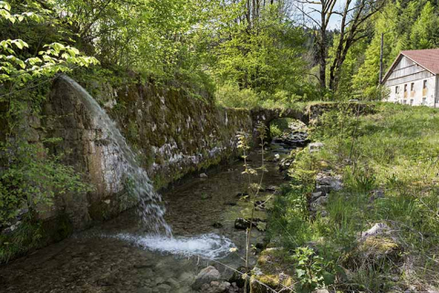 Emplacement de la taillanderie Nicod (puis scierie Jacquet) et pont au-dessus du Théverot. © Région Bourgogne-Franche-Comté, Inventaire du patrimoine Emplacement de la taillanderie Nicod (puis scierie Jacquet) et pont au-dessus du Théverot. © Région Bourgogne-Franche-Comté, Inventaire du patrimoine