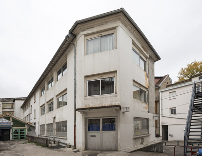 Façade sur cour d'un atelier de fabrication (n°4). © Région Bourgogne-Franche-Comté, Inventaire du patrimoine Façade sur cour d'un atelier de fabrication (n°4). © Région Bourgogne-Franche-Comté, Inventaire du patrimoine