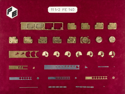 Phases de fabrication de composants d'un mouvement FE 140. (Collection musée de l'Horlogerie, Morteau). © Région Bourgogne-Franche-Comté, Inventaire du patrimoine