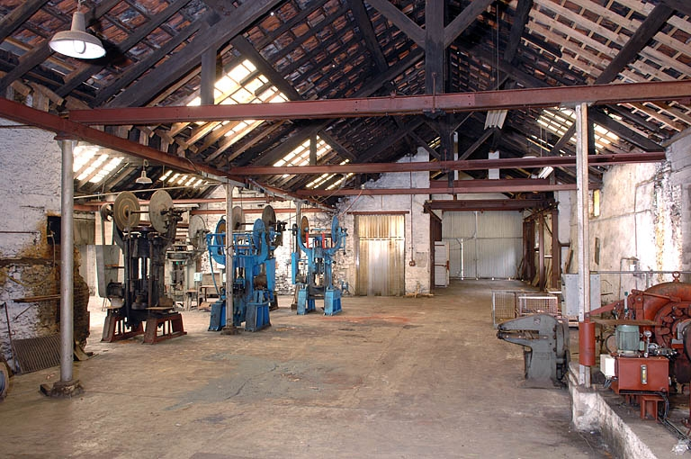 Travée nord-est de l'atelier dit des Balanciers. © Région Bourgogne-Franche-Comté, Inventaire du patrimoine Travée nord-est de l'atelier dit des Balanciers. © Région Bourgogne-Franche-Comté, Inventaire du patrimoine