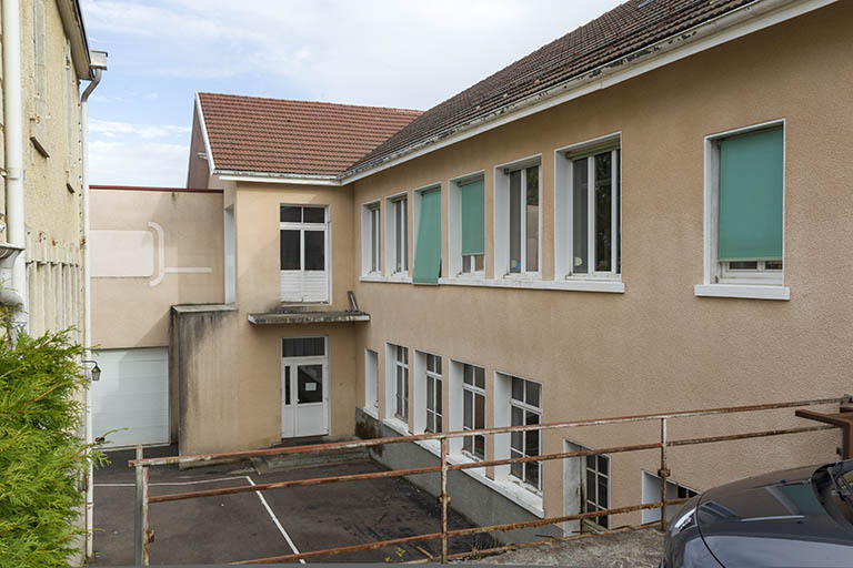 Usine : façade latérale gauche, depuis la Rue Neuve. © Région Bourgogne-Franche-Comté, Inventaire du patrimoine Usine : façade latérale gauche, depuis la Rue Neuve. © Région Bourgogne-Franche-Comté, Inventaire du patrimoine