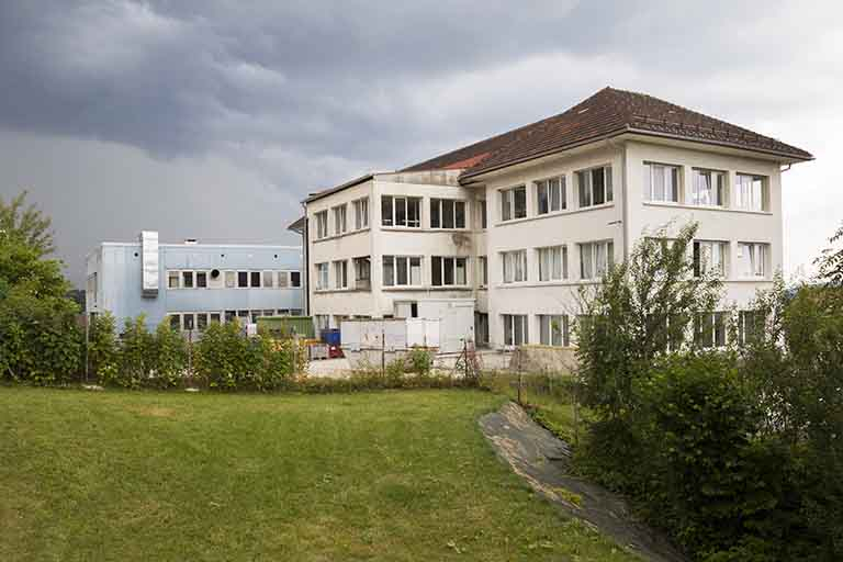 Ateliers de 1952 et 1970-1971 : façades postérieure et latérale gauche. © Région Bourgogne-Franche-Comté, Inventaire du patrimoine