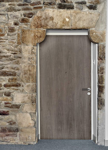 Porte à coussinets située près de la tour d'escalier. © Région Bourgogne-Franche-Comté, Inventaire du patrimoine