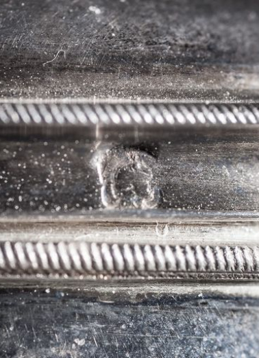 Poinçon : tête de Minerve. © Région Bourgogne-Franche-Comté, Inventaire du patrimoine