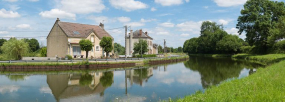 En amont du site, rive droite, vue de l'ancienne boutique double. © Région Bourgogne-Franche-Comté, Inventaire du patrimoine