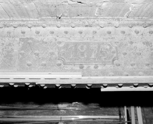 Détail d'une poutre de l'atelier, datée 1875. © Jean-Luc Duthu / Région Bourgogne-Franche-Comté, Inventaire du patrimoine - 2003