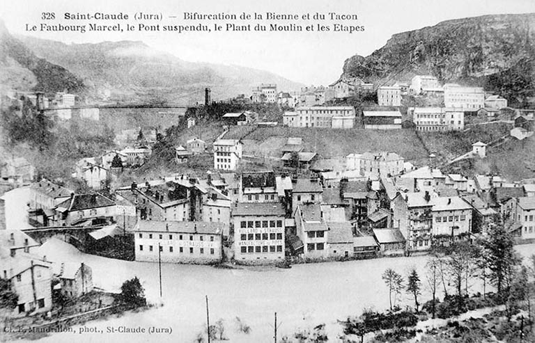 Saint-Claude (Jura) - Bifurcation de la Bienne et du Tacon. Le Faubourg Marcel, le Pont suspendu, le Plant du Moulin et les Etapes. © Jérôme  Mongreville (reproduction), E. Mandrillon / Région Bourgogne-Franche-Comté, Inventaire du patrimoine - 1992
