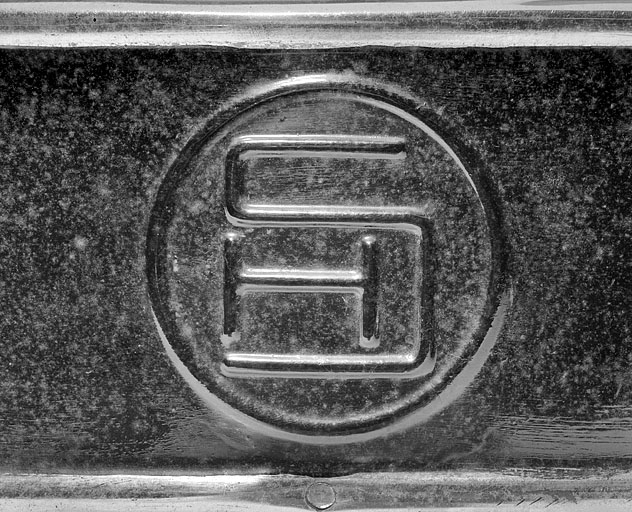 Logotype de la société Schnellpressenfabrik AG Heidelberg. © Jérôme Mongreville / Région Bourgogne-Franche-Comté, Inventaire du patrimoine - 2001