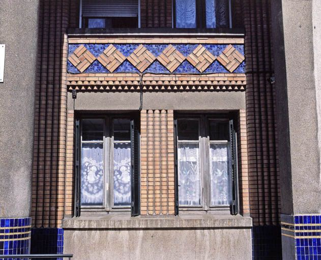 Bâtiment A : appareil de briques et mosaïques de la conciergerie. © Yves Sancey / Région Bourgogne-Franche-Comté, Inventaire du patrimoine - 2003 Bâtiment A : appareil de briques et mosaïques de la conciergerie. © Yves Sancey / Région Bourgogne-Franche-Comté, Inventaire du patrimoine - 2003
